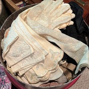 Box filled with vintage gloves
